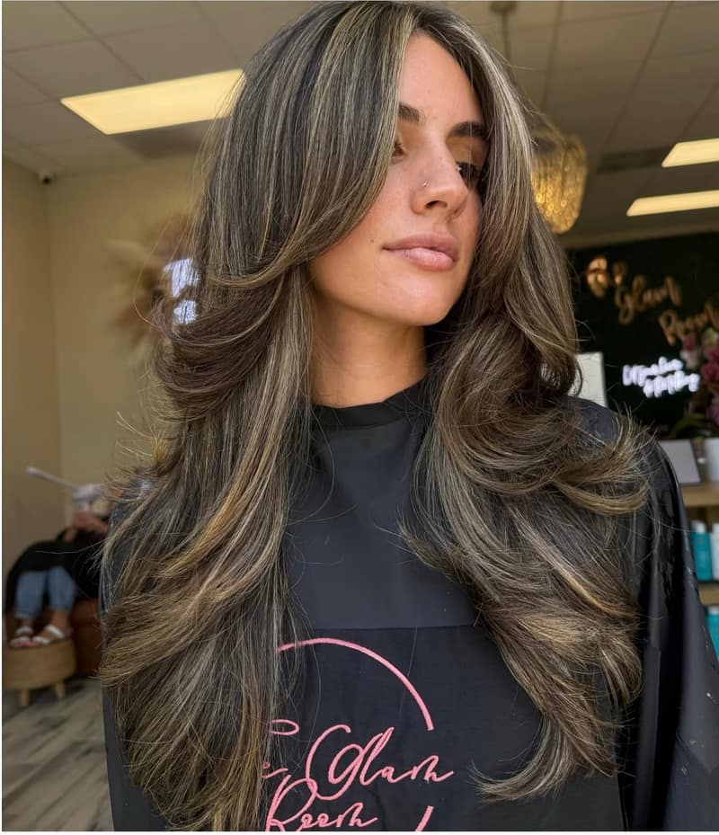 Bronde layered blowout finished with tape-in extensions